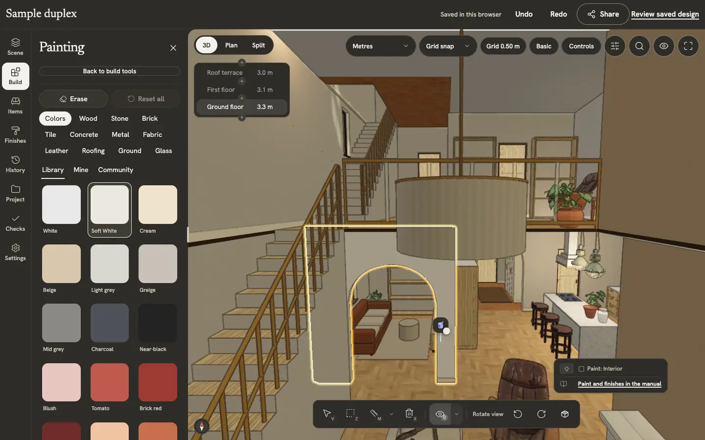The Mediterranean sample duplex, living view in the editor with the Painting library and an interior wall highlighted for Soft White.