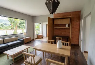 Living and dining room of a furnished apartment, an AI photo